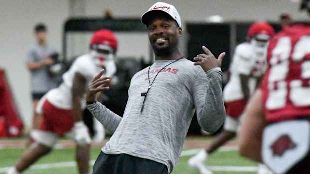 Razorbacks defensive backs coach Deron Wilson at practice Monday morning indoors